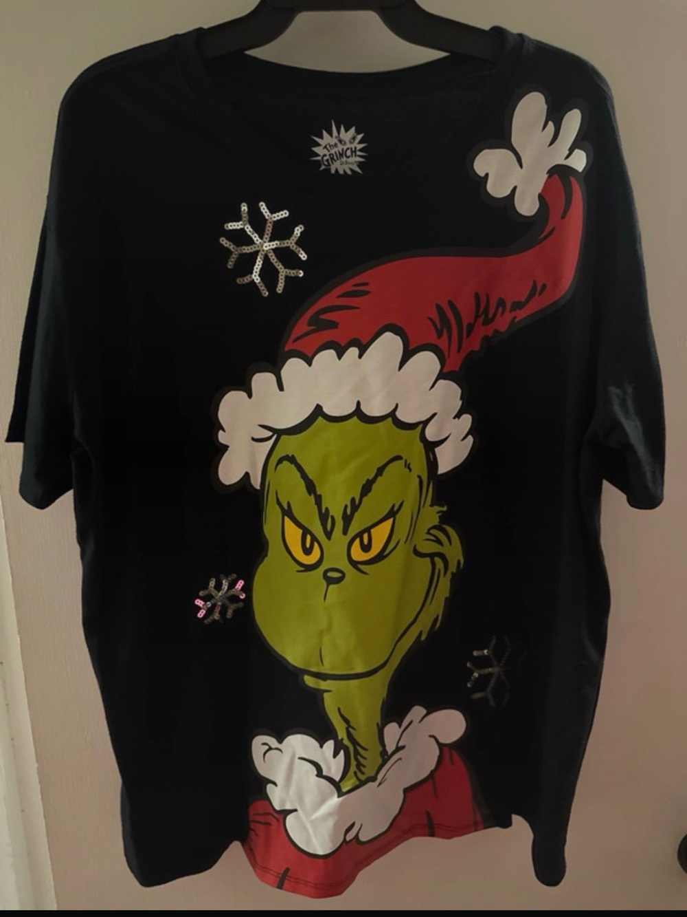 The Grinch Black Graphic Tee with Red Santa Hat